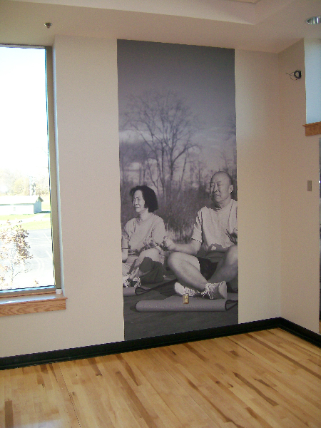 Commercial wallpaper installation in a professional office environment